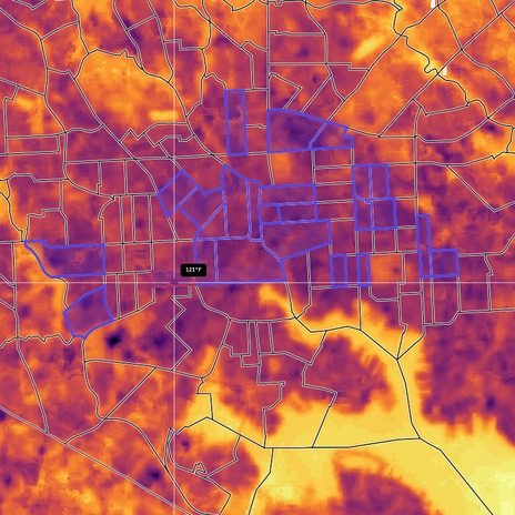Land surface temperature across Baltimore with the 24 hottest low-cooling-access tracts outlined